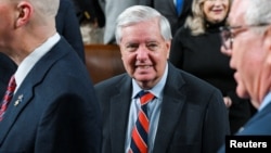 Senator Lindsey Graham of South Carolina (center), who died over the weekend, was one of the sanctions bill's chief architects.