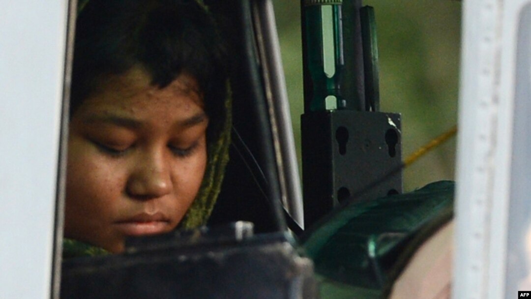 Rimsha Masih, a disabled Pakistani Christian girl accused of insulting Islam sits in a helicopter after her release from jail in Rawalpindi. She had been held on blasphemy charges for over a month until domestic and international condemnation prompted her release.