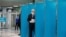 Kazakh President Qasym-Zhomart Toqaev votes during Kazakhstan's parliamentary election in Almaty on January 10, 2021.