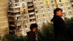 Damage at the site of a residential building in Kyiv hit during a Russian jet-powered drone strike on September 27.