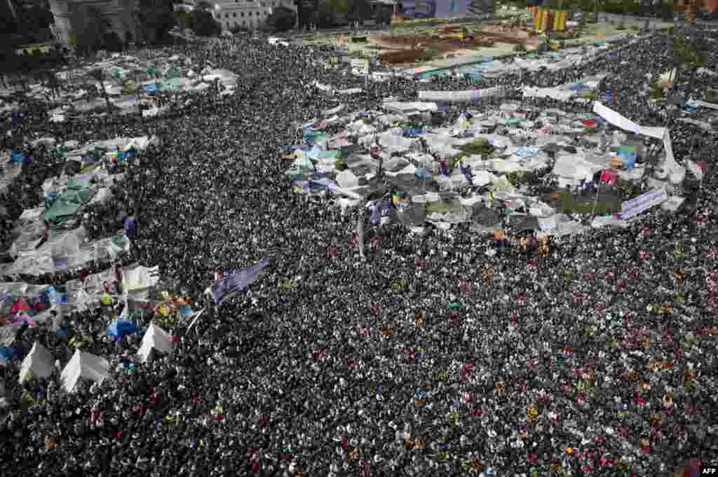 Antigoverment demonstrators flood Tahrir Square on February 11, 2011.