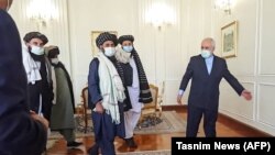 جواد ظریف میزبان ملا عبدالغنی برادر از پایه‌گذاران و رهبران طالبان در تهران