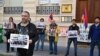 France - French-Armenian activist Schanth Vosgueritchian leads a protest outside the Armenian Embass in Paris, 28April 2015.