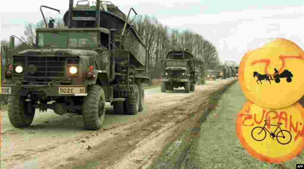 A convoy from the First U.S. Army carries boats and pontoons to Slavonski Brod on December 13, 1995. As part of the Dayton peace agreement they will construct a bridge across the Sava River that will link Bosnia and Croatia.&nbsp;