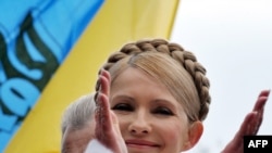 Opposition leader Yulia Tymoshenko all opposition forces must unite to resist the deal with the Kremlin.