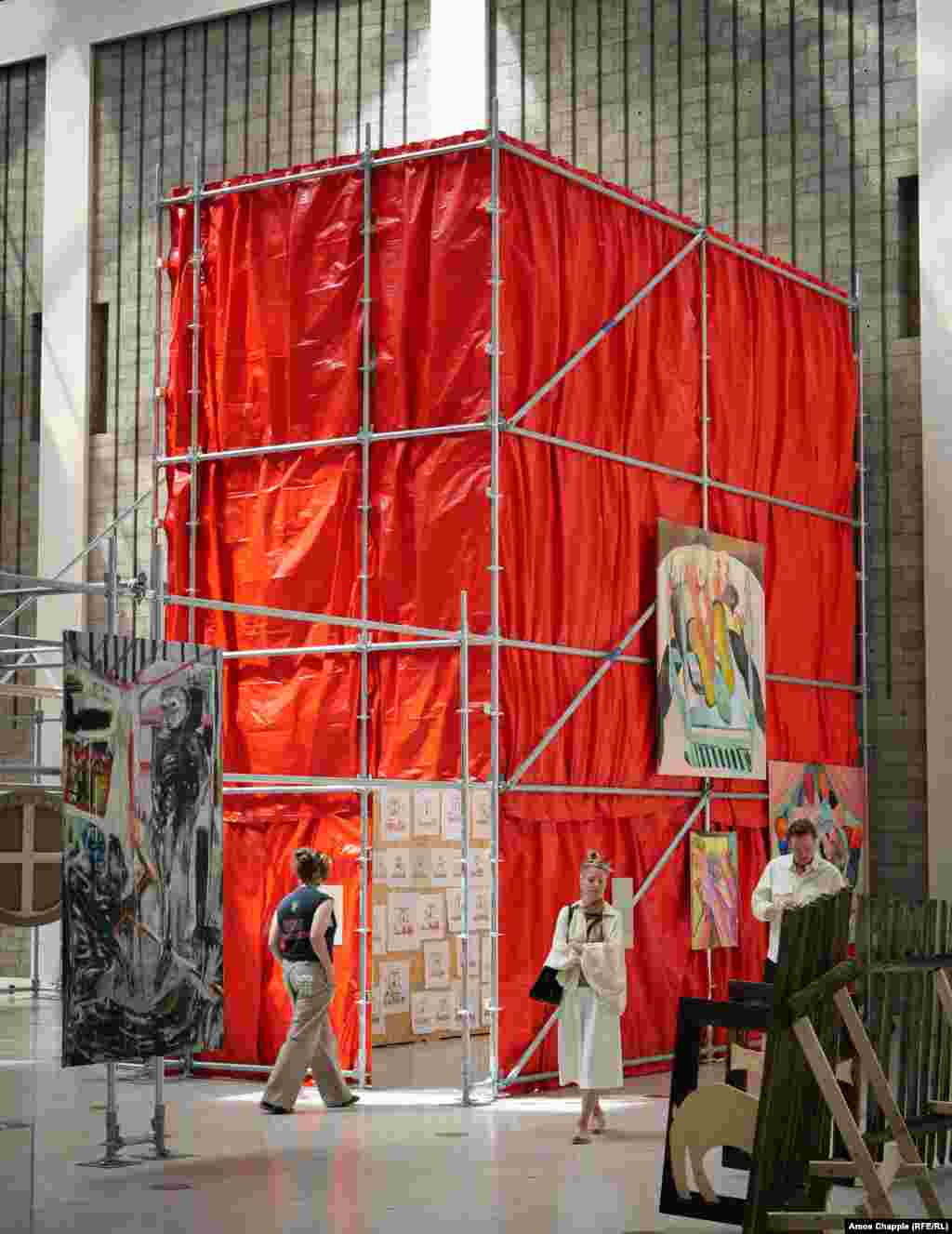Inside this display in a Prague exhibition hall, the plight of political prisoners in Belarus is being highlighted in an art form usually associated with traditional Slavic clothing.
