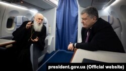 Патриарх Филарет и Пётр Порошенко, 28 декабря 2018 года 