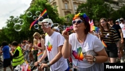 People attend the annual Budapest Pride march on June 22.