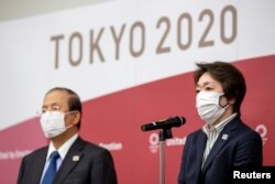 Виконавчий директор оргкомітету Олімпійських ігор у Токіо Тошіро Муто і президент японського організаційного комітету Олімпіади Сейко Хасімото
