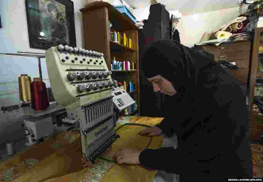 A nun checks the embroidery on the fabric of a miter. According to Sister&nbsp;Efimija, miters from North Macedonia are worn by bishops and archbishops in Russia, the United States, Eastern and Western Europe, and Africa. She says the lavish Byzantine style is highly valued in the Greek Orthodox Church.&nbsp; &nbsp;