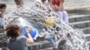 Armenia -- Residents of Yerevan celebrate the festival of Vardavar pouring water upon each other (file photo)