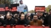 Vladimir Kara-Murza (left), Yulia Navalnaya, widow of the late Russian opposition leader Aleksei Navalny (center), and Ilya Yashin march in Berlin on November 17.