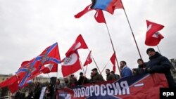Митинг в поддержку "Новороссии" в России.