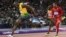 U.K. -- Jamaica's Usain Bolt (L) wins the men's 100m final at the athletics event during the London 2012 Olympic Games in London, 05Aug2012