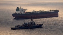 A photo released by US Central Command on May 8 shows the USS Rafael Peralta implementing a maritime blockade against an Iran-flagged crude oil tanker vessel.