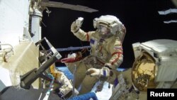 Roscosmos cosmonauts Sergei Prokopyev and Dmitry Petelin conduct a space walk outside the International Space Station on November 17. 